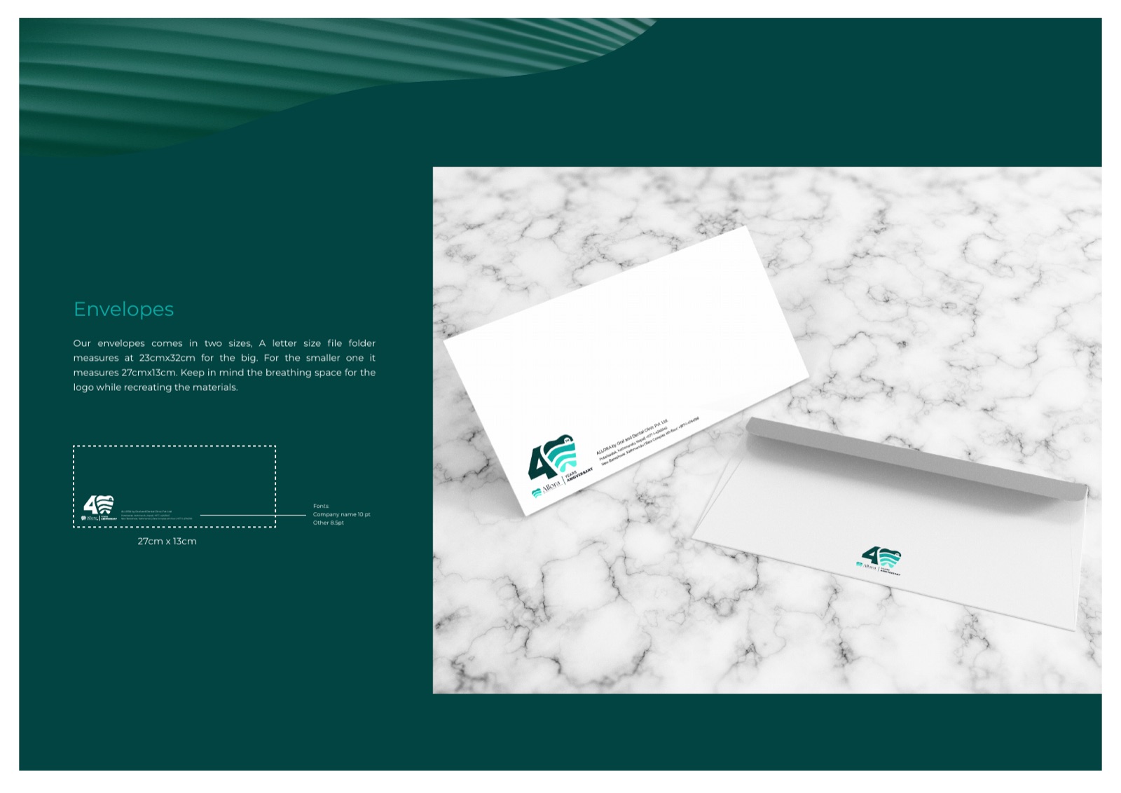 Allora stationery laid out on marble, with a card and pen
