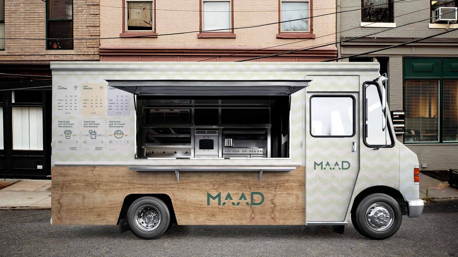 MAAD branded food truck parked on a street