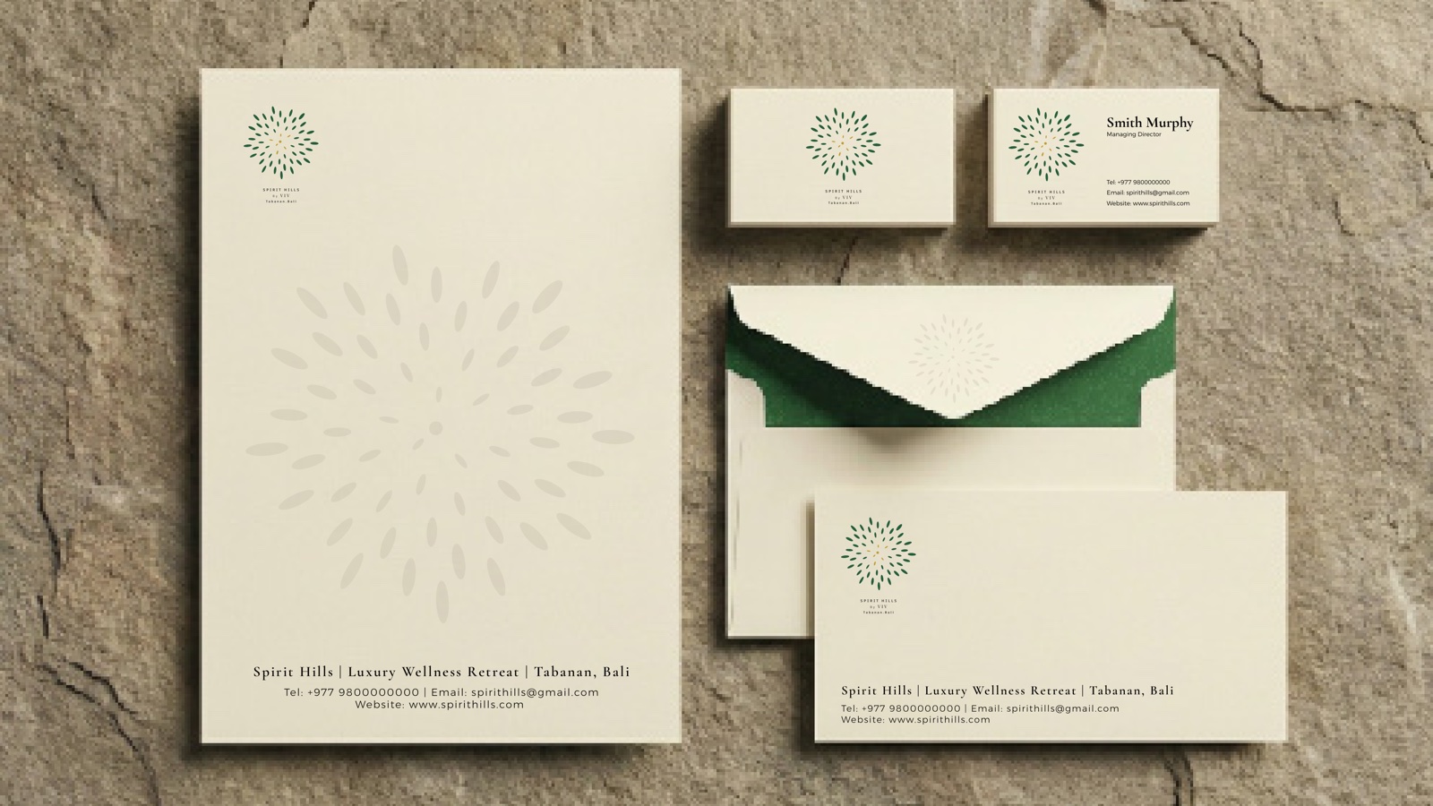 Spirit Hills stationery, the seed-burst mark applied across printed pieces