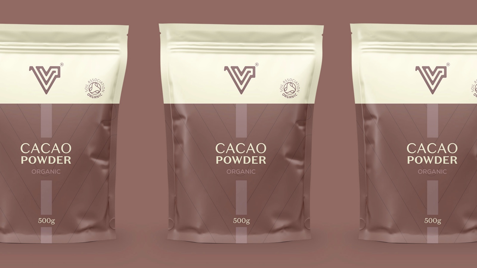 Three Valens organic cacao powder pouches in cream and mauve